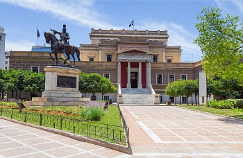 Exterior view of the National Historical Museum (Former Greek Parliament) and statue of Kolokotronis