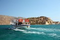A pleasure boat takes day trippers to Spinalonga island and fortress, Crete 