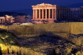 The moon illuminating the Acropolis with a pink hue