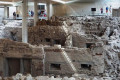 The prehistoric city of Akrotiri in Santorini was destroyed by the volcano sometime in the 16th century BCE