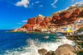 Waves crashing on Ammoudi Bay in Santorini