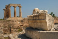 Column ruins (foreground) and the Temple of Apollo (background), Ancient Corinth.