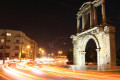 Hadrian's Arch through the bustling Athenian traffic