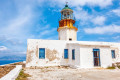 The iconic landmark of Armenistis lighthouse in Mykonos