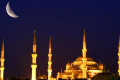 Stunning view of the Blue Mosque under the crescent moon