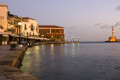 Old port and lighthouse early in the morning in Chania city, Crete island