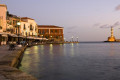 The old port of Chania as the sun rises over Crete