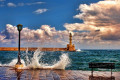 In the old harbour of Chania, as the waves crash on the waterfront