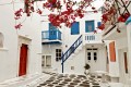 White washed flowery Mykonos street, Aegean cruise