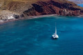 Sailing with a catamaran on the caldera