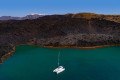 Sailing around Santorini in a catamaran