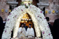 Epitaphios decorated in Easter with flowers and embroidered cloths