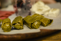 Dolmades consist of rice and meat wrapped in vine leaves and can be part of a Greek meal in every occasion