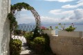 Flowery entrance and view of the Aegean sea, Naxos island