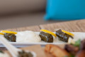 Dolmades are made or vine leaves and is a preferred summer food in Greece