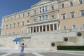 On top of Syntagma square in the heart of Athens stands the Greek Parliament