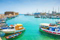 Colorful fishing boats in the port of Heraklion