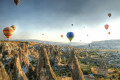 Hot Air Balloons over a gorgeous landscape in Cappadocia