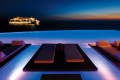 Romantic infinity pool of Cavoo Tagoo Resort by night, Mykonos island