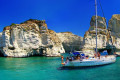 Sailing around the incredible Sarakiniko beach in Milos