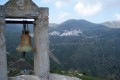 Church bell tower and view of Koronida village, Naxos island