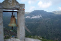 Church bell and panoramic view of Koronida village, Naxos island