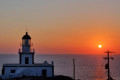 The Venetian Lighthouse on the coast of Santorini as seen while sailing nearby
