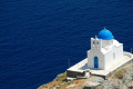 The lovely white and blue cycladic chapel of the Seven Martyrs by the sea, Sifnos island