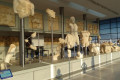 Ancient statues and artefacts exhibited in the Acropolis Museum