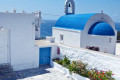 The epitome of Cycladic architecture exhibited in this blue-domed church
