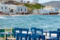 Seaside tavern and the famous windmills, Mykonos island