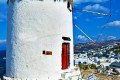 One of the iconic whitewsahed windmills of Mykonos