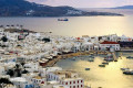 Sunset on the port of Mykonos in Chora