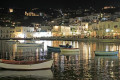 Fishing boats on the old port of Mykonos at night