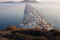 Wave crasher in Naxos as the sun rises over the island