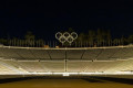 The Olympic Rings sitting on top of the stands of Kallimarmaro which hosted the first modern Olympic Games in 1896