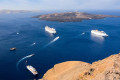 Cruise ships circling the Santorinian caldera