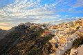 Panoramic view of Fira perched on a cliff in Santorini