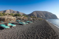 The Black beach in Santorini is laid with volcanic sand