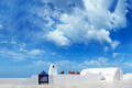 Cycladic architecture against the blue Santorinian sky in Imerovigli