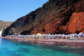 Volcanic Red Beach in Santorini, named after the distinct color of its pebbles