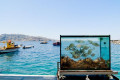 Trquoise waters in the Aegean Sea in Santorini