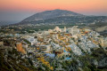Panoramic shot of Fira in Santorini at dusk