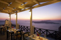 Dusk in Santorini as seen from the porch of a Fira restaurant