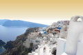 Beautiful view of sugar cube houses and the caldera below in Fira, Santorini