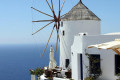 Windmills lazily turning in Santorini