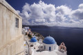 Even on a rare cloudy day, the view of the caldera from Oia is nothing less than stunning