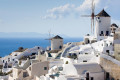 Cycladic white-washed houses against the blue backdrop of the caldera in Imerovigli, Santorini