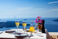 Any meal is better while admiring the stupefying view of the submerged volcano that Santorini encircles