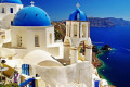 Blue domed church in Oia, on the north end of Santorini